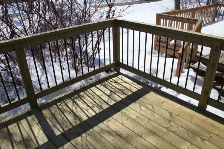 Allwright Contracting Victoria Beach Top sunroom and deck construction