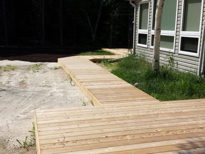 Allwright Contracting Victoria Beach Top sunroom and deck construction